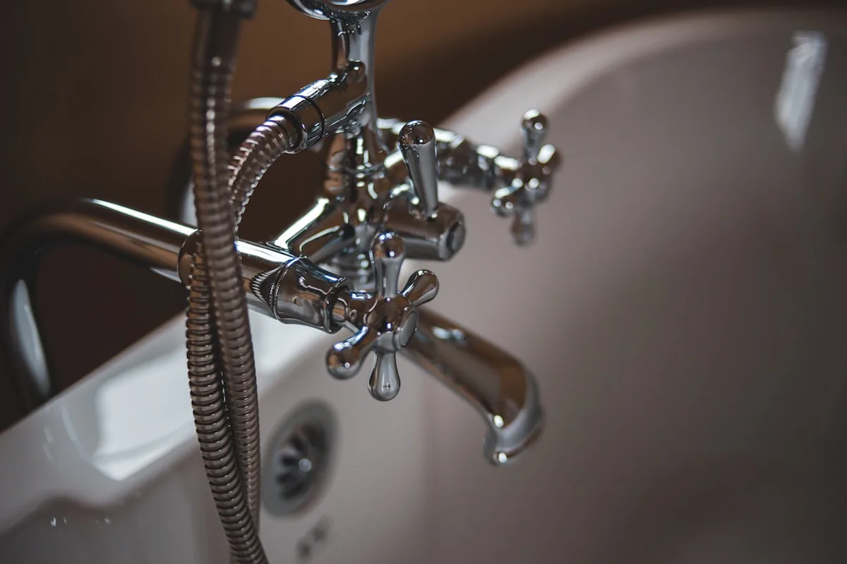 Chrome bathtub plumbing fixture ready for installation