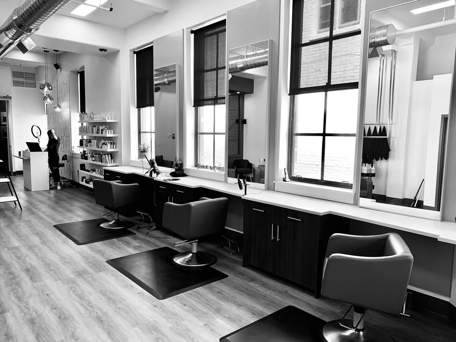 Bright boutique hair salon with styling stations